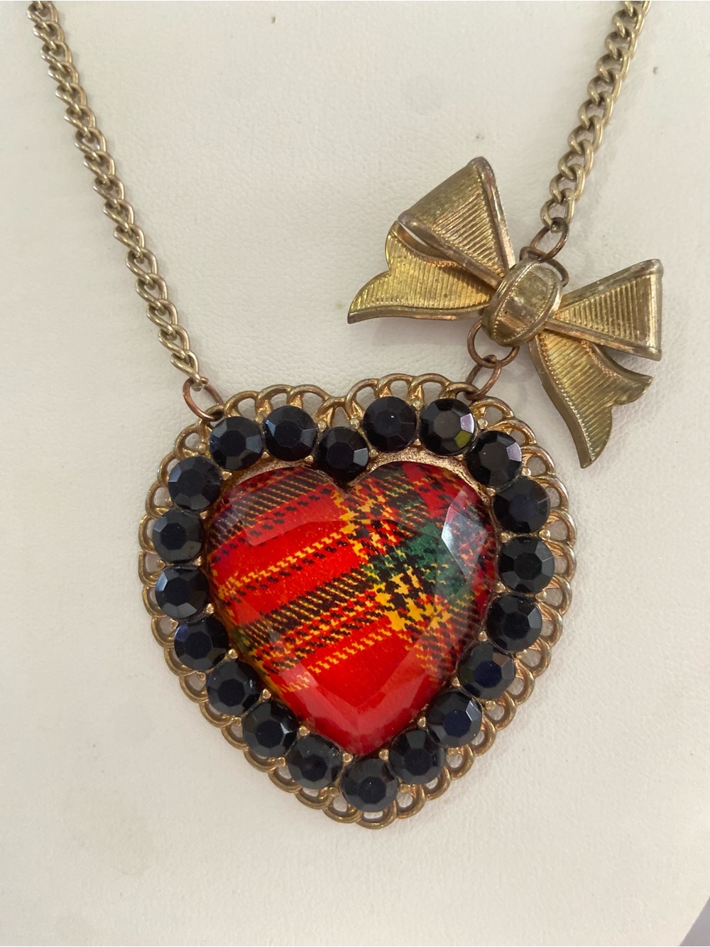 Aldo Gold Bow Necklace with Red Plaid Heart and Black Stones